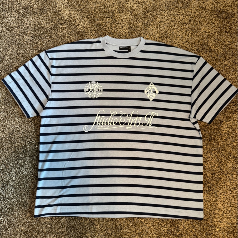 ASOS’s “Studio Art” Blue Striped Tee